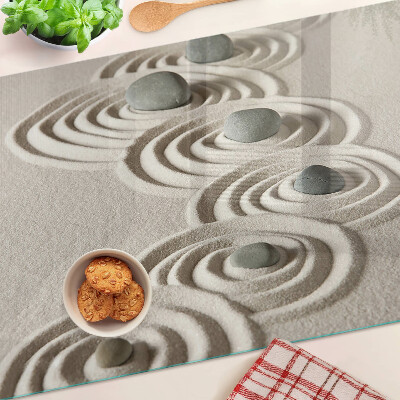 Tagliere in vetro con motivi ondulati ispirati alla sabbia