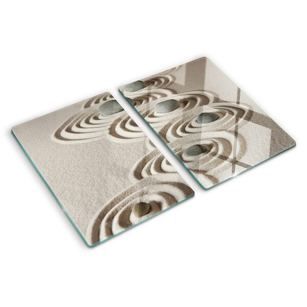 Tagliere in vetro con motivi ondulati ispirati alla sabbia