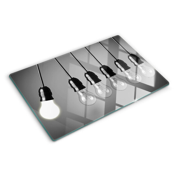 Tagliere in vetro temperato con motivo a lampadine sui cavi