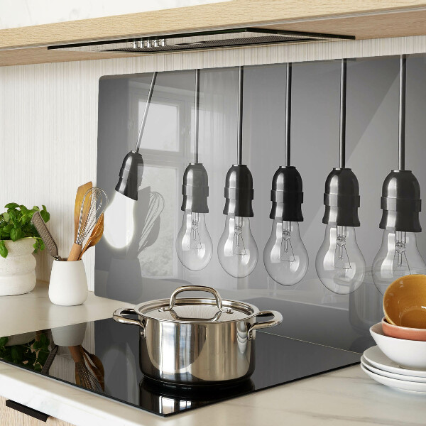 Tagliere in vetro temperato con motivo a lampadine sui cavi