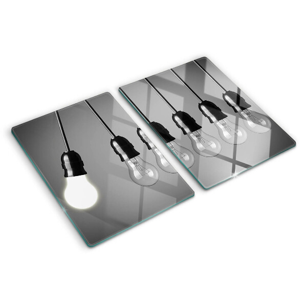 Tagliere in vetro temperato con motivo a lampadine sui cavi