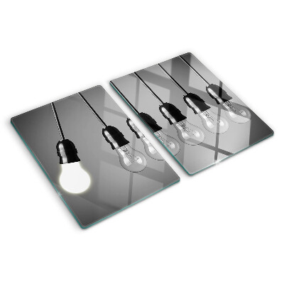 Tagliere in vetro temperato con motivo a lampadine sui cavi