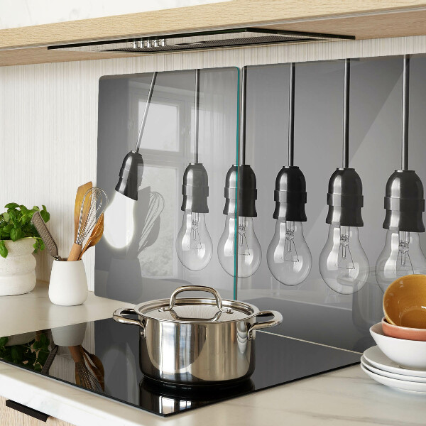 Tagliere in vetro temperato con motivo a lampadine sui cavi