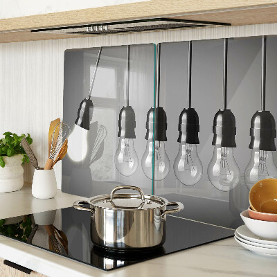 Tagliere in vetro temperato con motivo a lampadine sui cavi