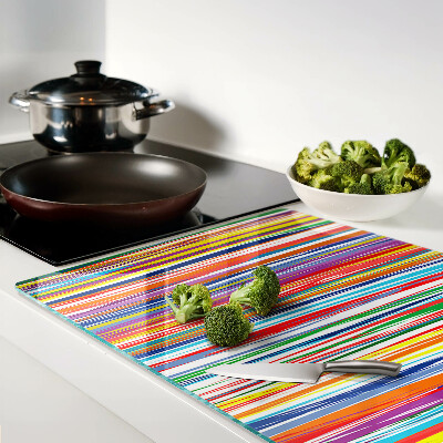 Tagliere in vetro con strisce colorate in varie tonalità