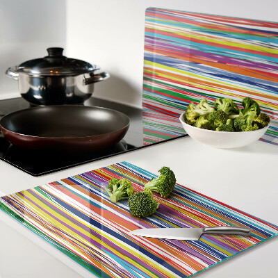 Tagliere in vetro con strisce colorate in varie tonalità