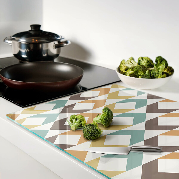 Tagliere in vetro temperato con motivo geometrico nei toni pastello