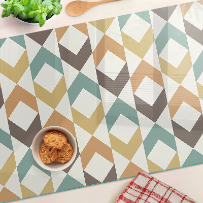 Tagliere in vetro temperato con motivo geometrico nei toni pastello