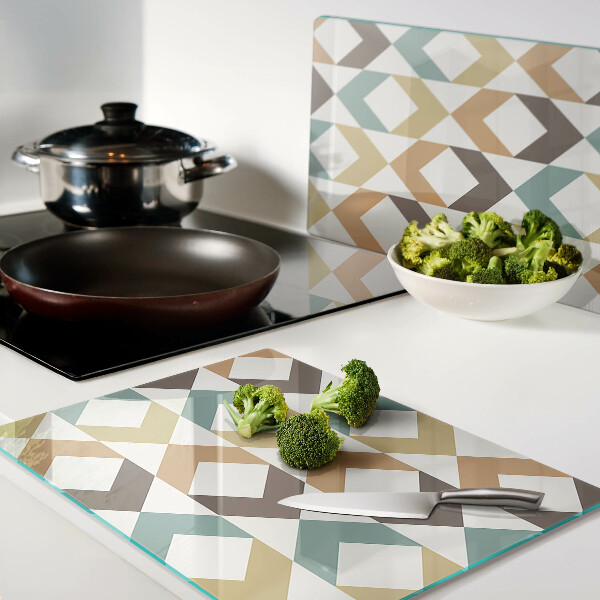 Tagliere in vetro temperato con motivo geometrico nei toni pastello