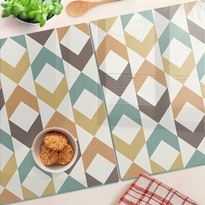 Tagliere in vetro temperato con motivo geometrico nei toni pastello