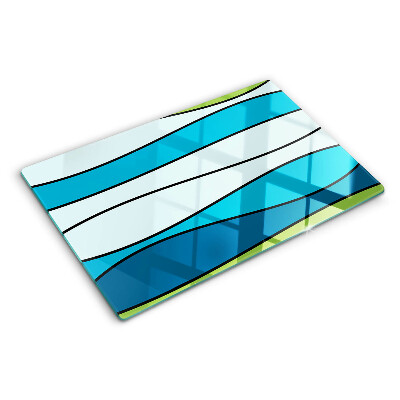 Tagliere in vetro con motivo a onde nei toni del blu e del verde