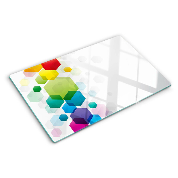 Tagliere in vetro con motivo a esagoni colorati sullo sfondo