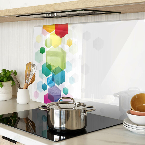 Tagliere in vetro con motivo a esagoni colorati sullo sfondo