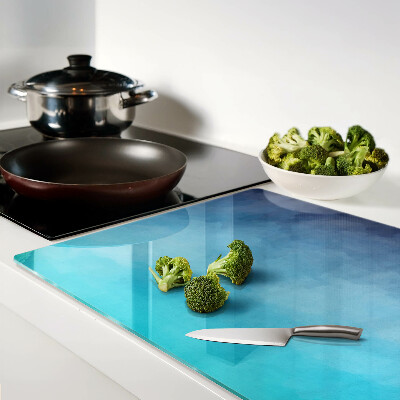 Tagliere in vetro con finitura trasparente nei toni del blu effetto nebbia