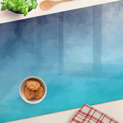 Tagliere in vetro con finitura trasparente nei toni del blu effetto nebbia