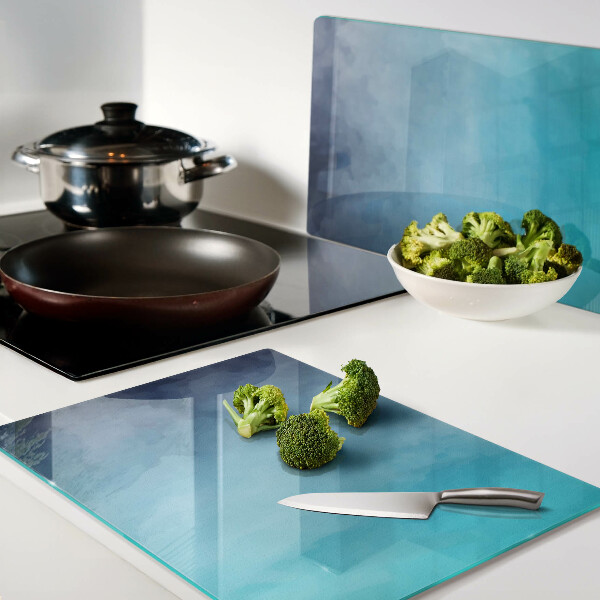 Tagliere in vetro con finitura trasparente nei toni del blu effetto nebbia