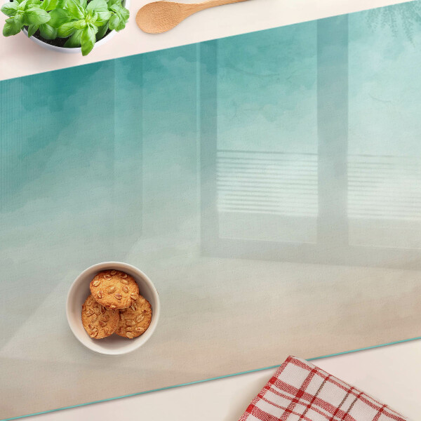 Tagliere in vetro temperato con gradiente nei toni del blu e dell'arancione