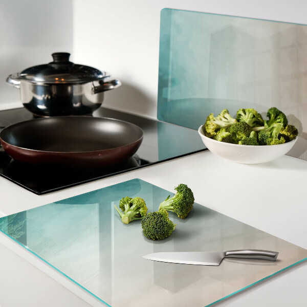 Tagliere in vetro temperato con gradiente nei toni del blu e dell'arancione