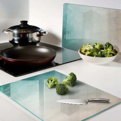 Tagliere in vetro temperato con gradiente nei toni del blu e dell'arancione