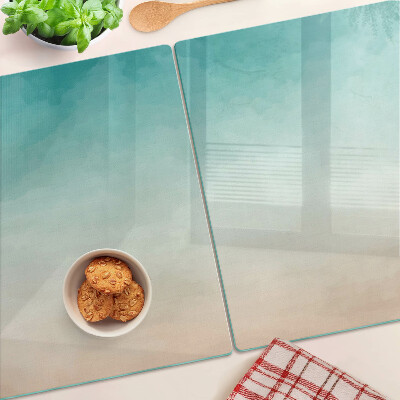 Tagliere in vetro temperato con gradiente nei toni del blu e dell'arancione