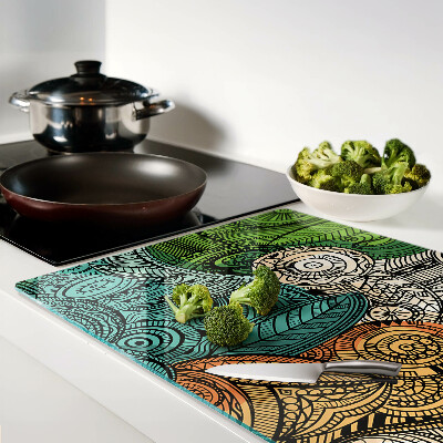 Tagliere in vetro temperato con motivo mandala dai disegni colorati