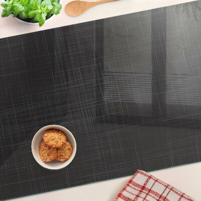 Tagliere in vetro con motivo geometrico di linee e ombre