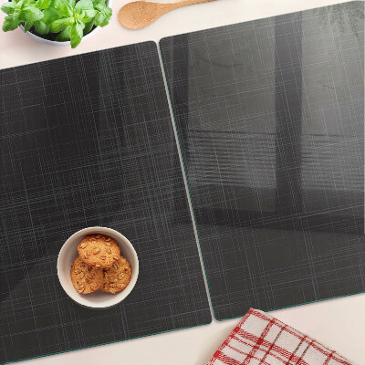 Tagliere in vetro con motivo geometrico di linee e ombre