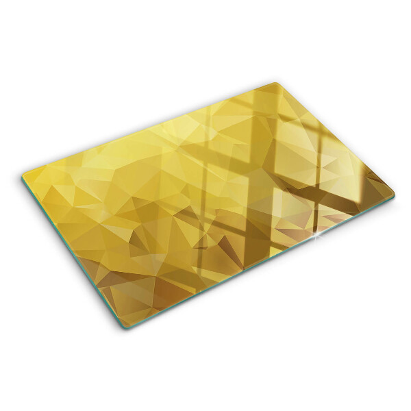 Tagliere in vetro temperato con motivo geometrico nei toni dell'oro