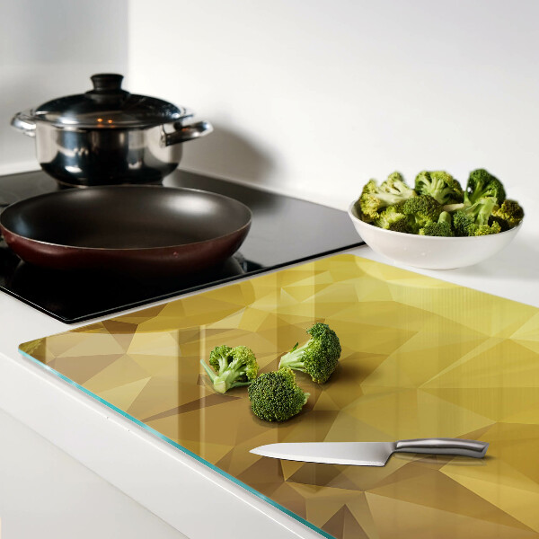 Tagliere in vetro temperato con motivo geometrico nei toni dell'oro