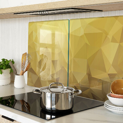 Tagliere in vetro temperato con motivo geometrico nei toni dell'oro