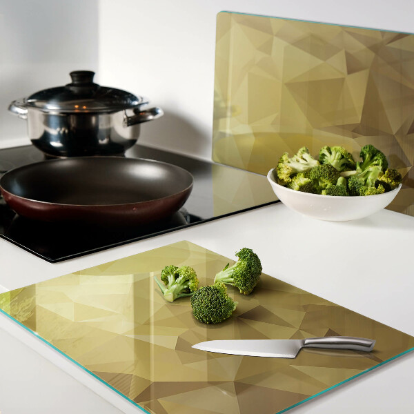 Tagliere in vetro temperato con motivo geometrico nei toni dell'oro