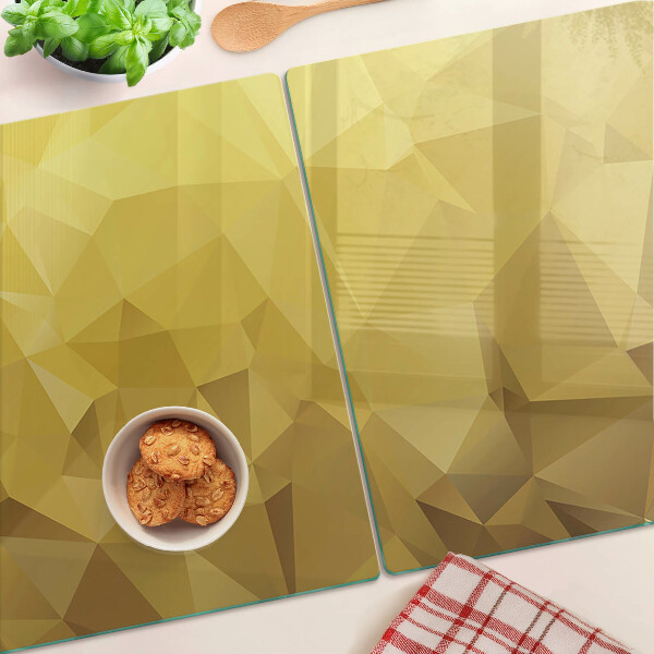 Tagliere in vetro temperato con motivo geometrico nei toni dell'oro