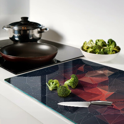 Tagliere in vetro temperato con motivo a geometria astratta nei toni del rosso