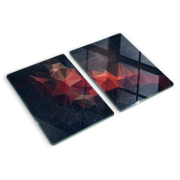 Tagliere in vetro temperato con motivo a geometria astratta nei toni del rosso