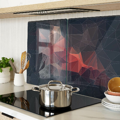 Tagliere in vetro temperato con motivo a geometria astratta nei toni del rosso