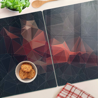 Tagliere in vetro temperato con motivo a geometria astratta nei toni del rosso