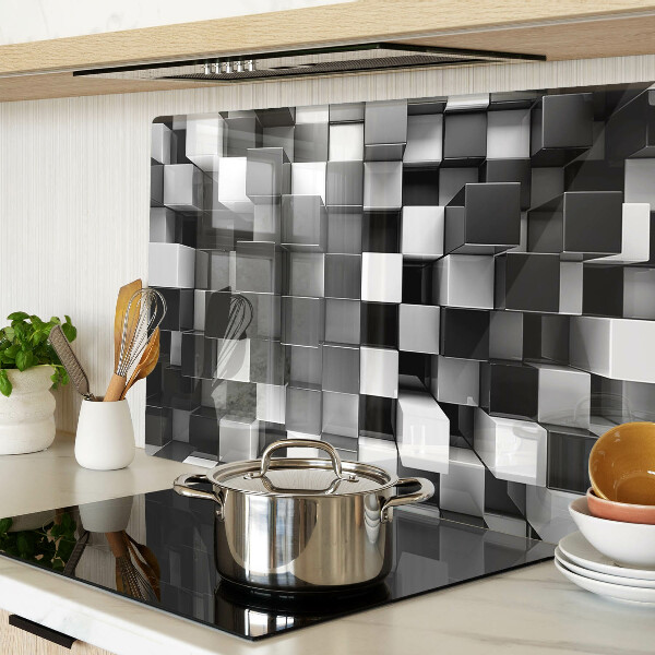 Tagliere in vetro temperato con motivo a scacchiera nei toni del bianco e nero