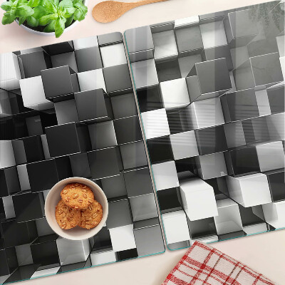 Tagliere in vetro temperato con motivo a scacchiera nei toni del bianco e nero