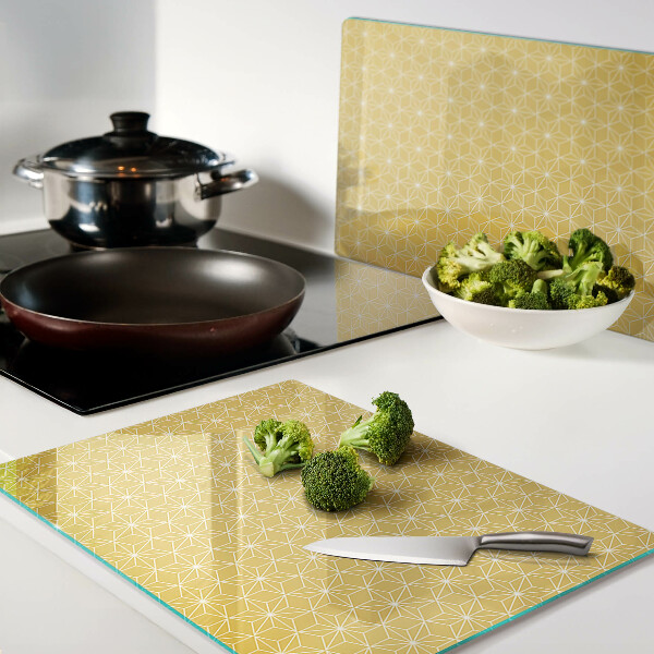 Tagliere in vetro temperato con decorazione Fiore della vita su sfondo giallo