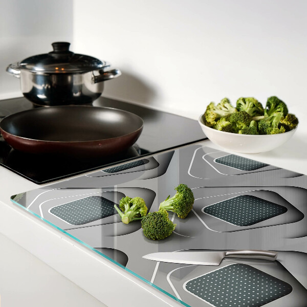 Tagliere in vetro temperato con motivi geometrici nei toni del grigio