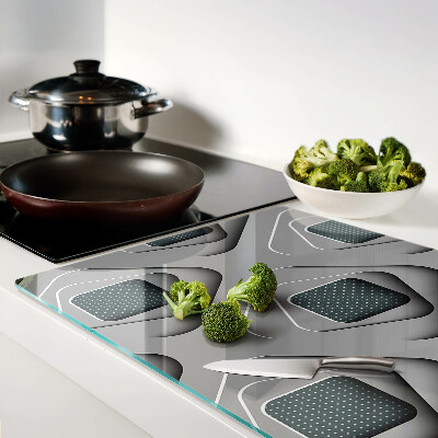 Tagliere in vetro temperato con motivi geometrici nei toni del grigio