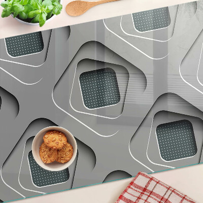 Tagliere in vetro temperato con motivi geometrici nei toni del grigio