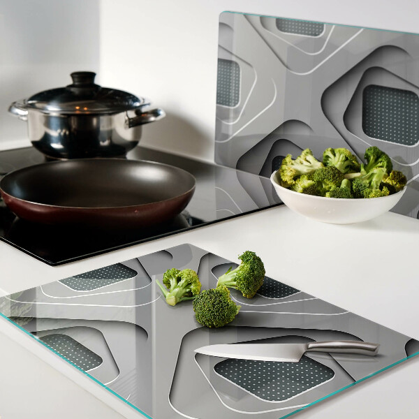 Tagliere in vetro temperato con motivi geometrici nei toni del grigio