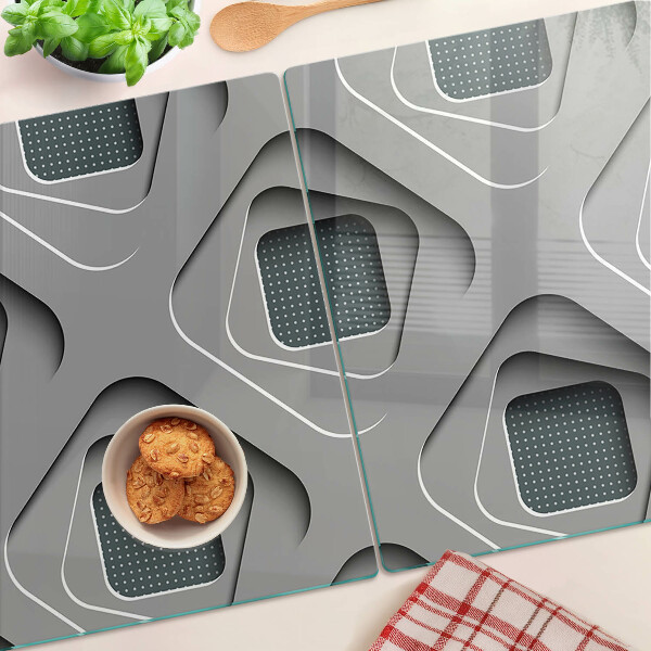 Tagliere in vetro temperato con motivi geometrici nei toni del grigio