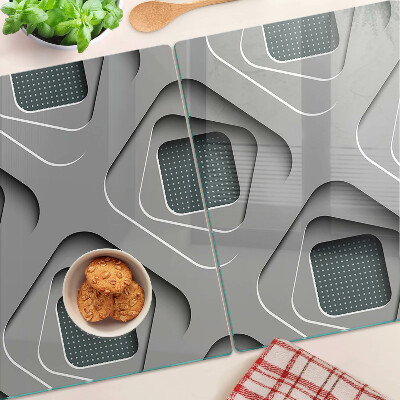 Tagliere in vetro temperato con motivi geometrici nei toni del grigio