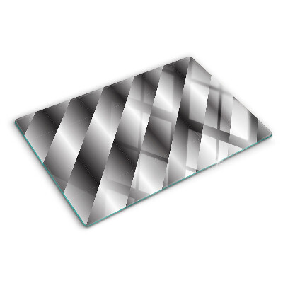 Tagliere in vetro temperato con motivi geometrici nei toni del grigio