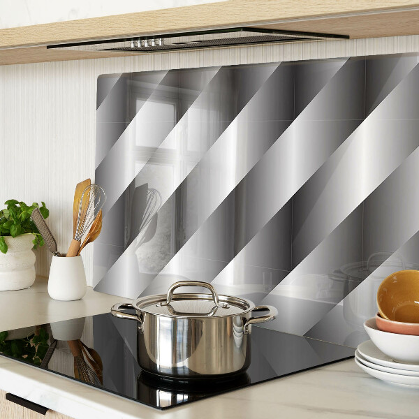 Tagliere in vetro temperato con motivi geometrici nei toni del grigio