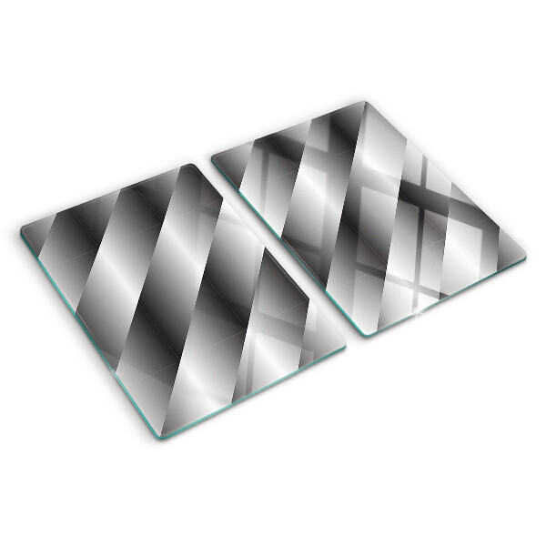 Tagliere in vetro temperato con motivi geometrici nei toni del grigio