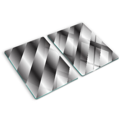 Tagliere in vetro temperato con motivi geometrici nei toni del grigio