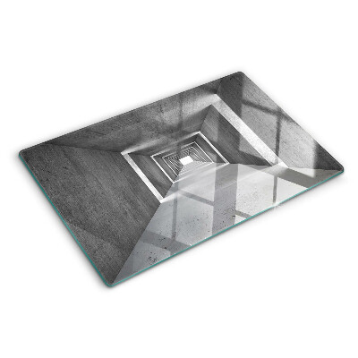 Tagliere in vetro con motivo a tunnel architettonico nei toni del grigio